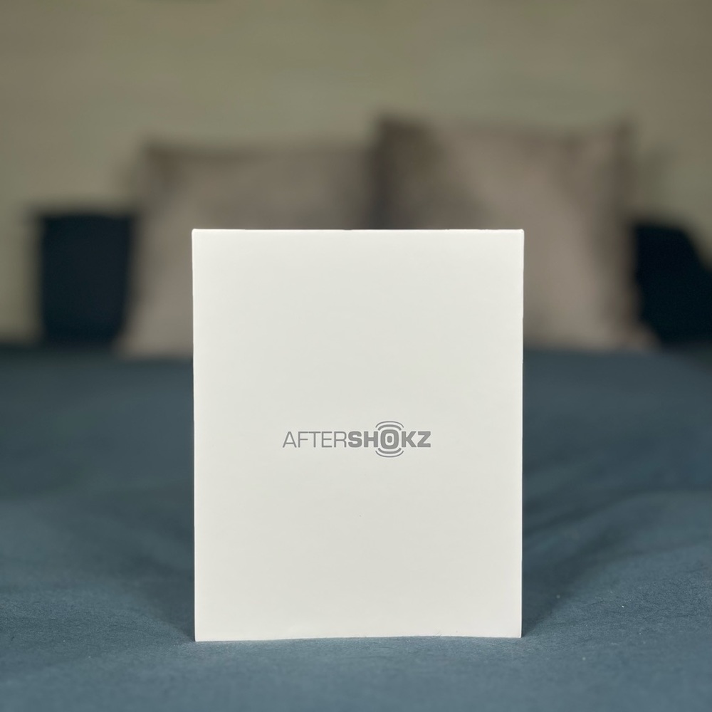Wireless Bluetooth headphones in original packaging.